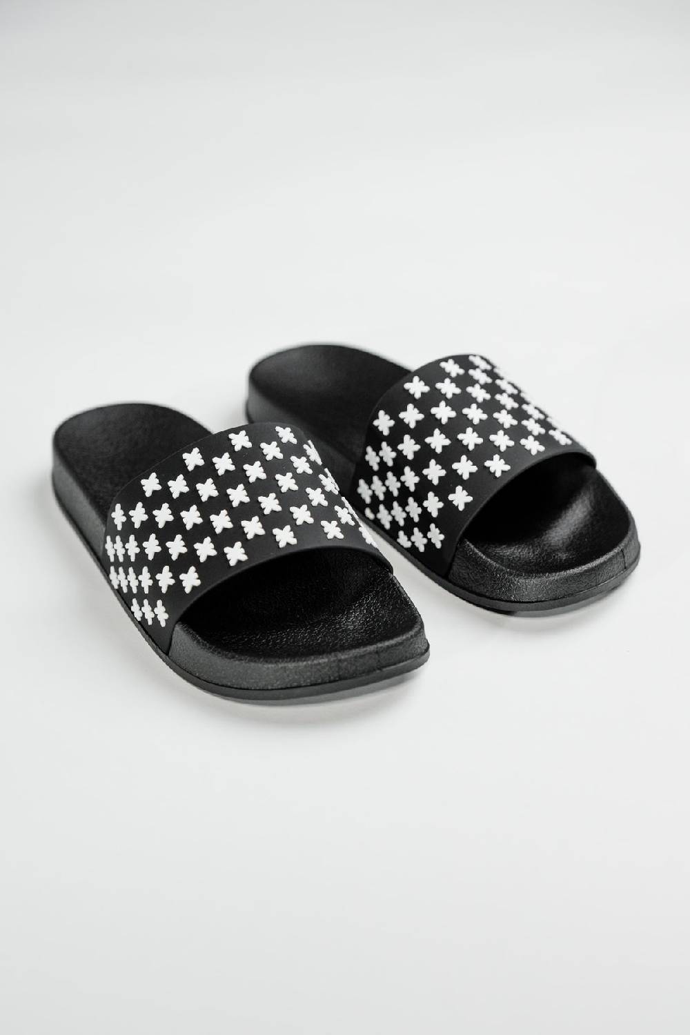 Karo Kauer Slipper Logo 50% Rabatt für begrenzte Zeit